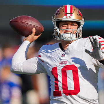 Nov 2, 2025; East Rutherford, New Jersey, USA; San Francisco 49ers quarterback Mac Jones (10) warms up prior to a game against the New York Giants at MetLife Stadium. Mandatory Credit: Robert Deutsch-Imagn Images