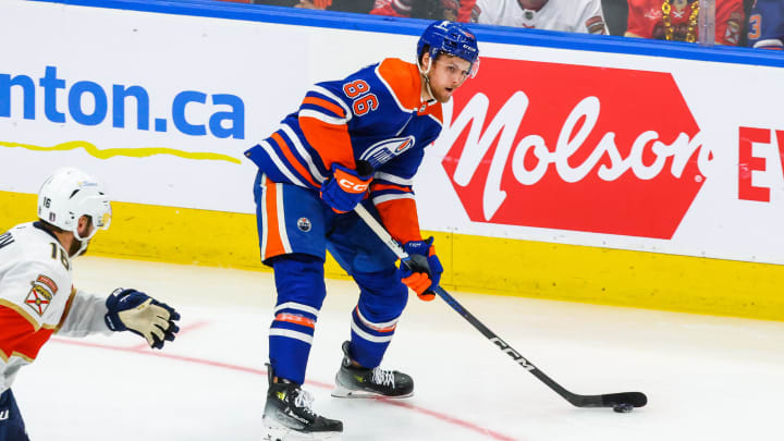 Jun 15, 2024; Edmonton, Alberta, CAN; Edmonton Oilers defenseman Philip Broberg (86) controls the puck against the Florida Panthers during the second period in game four of the 2024 Stanley Cup Final at Rogers Place. Mandatory Credit: Sergei Belski-USA TODAY Sports