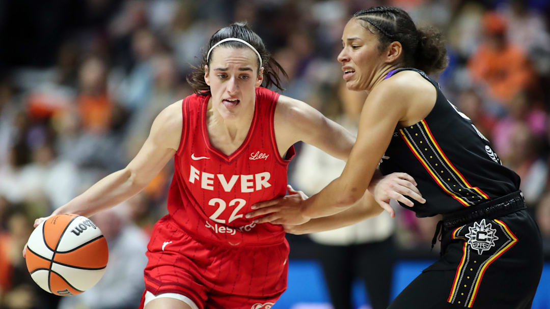 Sep 25, 2024; Uncasville, Connecticut, USA; Indiana Fever guard Caitlin Clark (22) dribbles the ball during the first half against the Connecticut Sun during game two of the first round of the 2024 WNBA Playoffs at Mohegan Sun Arena. Mandatory Credit: Paul Rutherford-Imagn Images