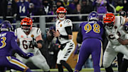 Bengals Joe Burrow (9) looks for a pass during their game against the Ravens at M&T Bank Stadium on Thanksgiving Thursday November 27, 2025.