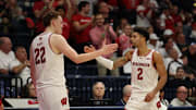 Nov 27, 2025; San Diego, CA, USA; Wisconsin Badgers guard Nick Boyd (2) reacts with Wisconsin Badgers forward Austin Rapp (22) after scoring against the Providence Friars during the second half at Jenny Craig Pavilion.