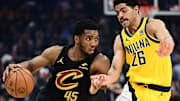 May 13, 2025; Cleveland, Ohio, USA; Cleveland Cavaliers guard Donovan Mitchell (45) drives to the basket against Indiana Pacers guard Ben Sheppard (26) during the first half of game five of the second round for the 2025 NBA Playoffs at Rocket Arena. Mandatory Credit: Ken Blaze-Imagn Images