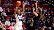 Johnston's Jenica Lewis (10) takes a shot during the 2025 girls state basketball tournament on Monday, March 3, 2025, at Wells Fargo Arena.