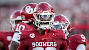Oklahoma defensive back Kani Walker (26) yells to fans in the first half of an NCAA football game between Oklahoma (OU) and Temple at the Gaylord Family Oklahoma Memorial Stadium in Norman, Okla., on Friday, Aug. 30, 2024.