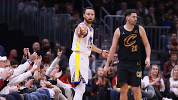 Golden State Warriors guard Steph Curry after losing a ball out of bounds near Cleveland Cavaliers guard Georges Niang 