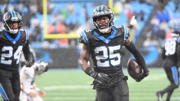 Carolina Panthers safety Xavier Woods (25) after intercepting the ball. Bob Donnan-USA TODAY Sports