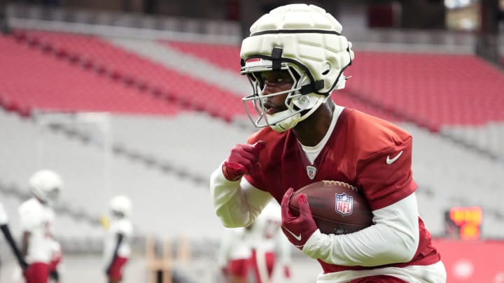 Arizona Cardinals running back Trey Benson (33) practices during the team's training camp session at State Farm Stadium in Glendale on July 24, 2024.