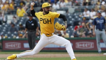 Jun 23, 2024; Pittsburgh, Pennsylvania, USA;  Pittsburgh Pirates relief pitcher Colin Holderman (35) pitches against the Tampa Bay Rays during the eighth inning at PNC Park. Mandatory Credit: Charles LeClaire-USA TODAY Sports