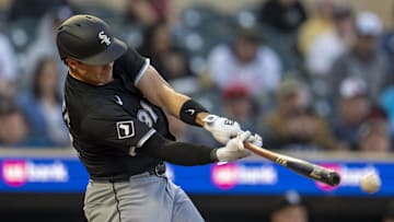 Apr 22, 2025; Minneapolis, Minnesota, USA; Chicago White Sox third baseman Bobby Dalbec (31) hits a double against the Minnesota Twins in the fourth inning at Target Field. Mandatory Credit: Jesse Johnson-Imagn Images