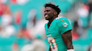 Miami Dolphins wide receiver Tyreek Hill reacts on the field before the game against the San Francisco 49ers