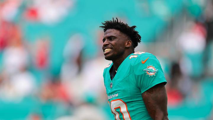 Dec 22, 2024; Miami Gardens, Florida, USA; Miami Dolphins wide receiver Tyreek Hill (10) reacts on the field before the game against the San Francisco 49ers at Hard Rock Stadium. Mandatory Credit: Sam Navarro-Imagn Images