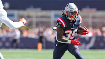 Oct 6, 2024; Foxborough, Massachusetts, USA; New England Patriots running back Rhamondre Stevenson (38) runs the ball during the first half against the Miami Dolphins at Gillette Stadium.