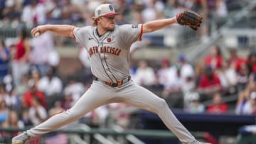 Jul 4, 2024; Cumberland, Georgia, USA; San Francisco Giants pitcher Logan Webb (62) pitches against the Atlanta Braves during the first inning at Truist Park.