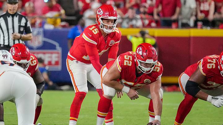 Kansas City Chiefs quarterback Patrick Mahomes (15) and center Creed Humphrey (52) versus Denver Broncos at Arrowhead Stadium