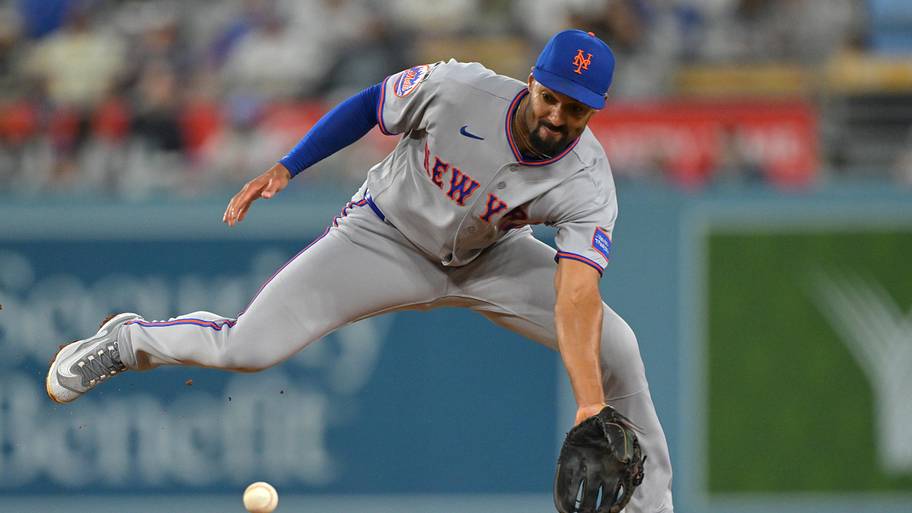 New York Mets second baseman Marcus Semien fields a groundball.