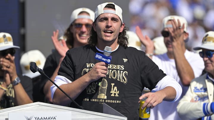 Nov 1, 2024; Los Angeles, CA, USA; Los Angeles Dodgers pitcher Brent Honeywell (40) speaks to fans during the World Series Championship Celebration at Dodger Stadium. Mandatory Credit: Jayne Kamin-Oncea-Imagn Images