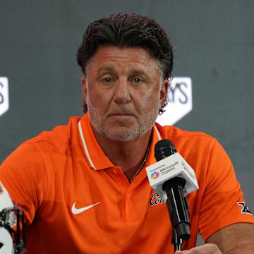 Jul 9, 2025; Frisco, TX, USA; Oklahoma State head coach Mike Gundy speaks with the media during 2025 Big 12 Football Media Days at The Star. Mandatory Credit: Raymond Carlin III-Imagn Images