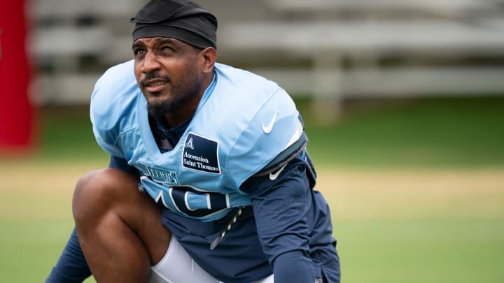 Tennessee Titans safety Quandre Diggs (26) stretches at Ascension Saint Thomas Sports Park in Nashville, Tenn., Wednesday, Aug. 14 2024. This is the first day of the Titans joint practice with the Seattle Seahawks.