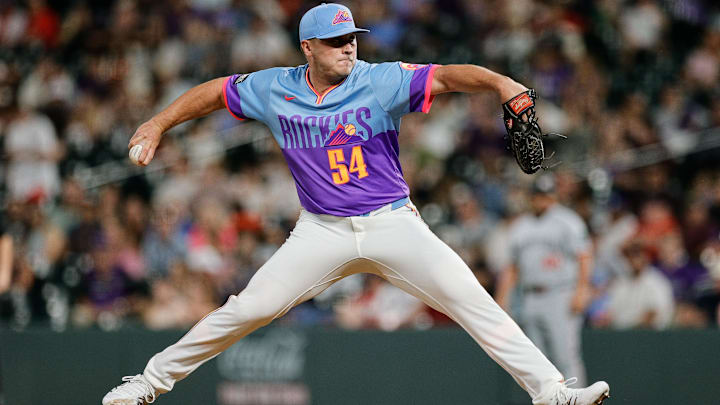 Jul 18, 2025; Denver, Colorado, USA; Colorado Rockies relief pitcher Seth Halvorsen (54) pitches in the ninth inning against the Minnesota Twins at Coors Field.