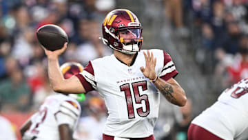 Aug 8, 2025; Foxborough, Massachusetts, USA; Washington Commanders quarterback Sam Hartman (15) passes the ball against the New England Patriots during the first half at Gillette Stadium. Mandatory Credit: Brian Fluharty-Imagn Images