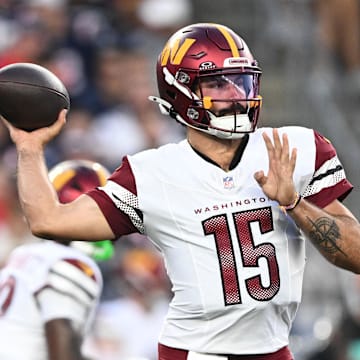 Aug 8, 2025; Foxborough, Massachusetts, USA; Washington Commanders quarterback Sam Hartman (15) passes the ball against the New England Patriots during the first half at Gillette Stadium. Mandatory Credit: Brian Fluharty-Imagn Images