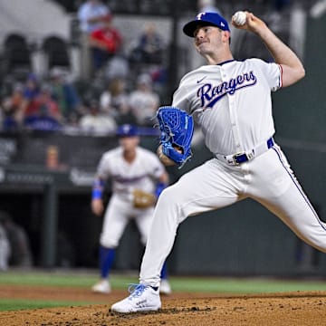 Sep 5, 2024; Arlington, Texas, USA; Texas Rangers starting pitcher Cody Bradford (61) pitches against the Los Angeles Angels during the second inning at Globe Life Field. Mandatory Credit: Jerome Miron-Imagn Images