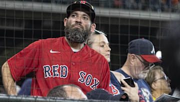 A Boston Red Sox fan reacts as the team struggles to score against the Houston Astros in the seventh inning at Minute Maid Park. 