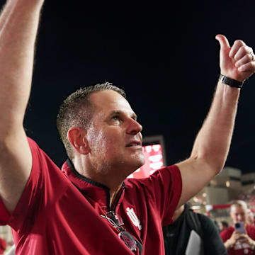Sep 20, 2025; Bloomington, Indiana, USA; Indiana Hoosiers head coach Curt Cignetti celebrates after defeating the Illinois Fighting Illini at Memorial Stadium. 