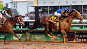 Sovereignty leads Journalism to the finish line to win the Kentucky Derby,