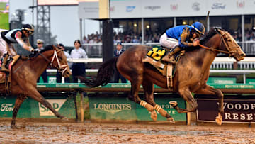 Sovereignty leads Journalism to the finish line to win the Kentucky Derby,