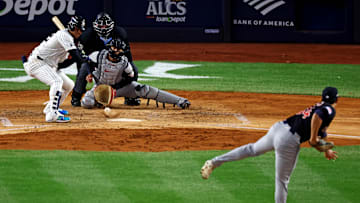 Oct 14, 2024; Bronx, New York, USA; Cleveland Guardians pitcher Joey Cantillo (54) throws a wild pitch to New York Yankees outfielder Juan Soto (22) during the fourth inning the in game one of the ALCS for the 2024 MLB Playoffs at Yankee Stadium. Mandatory Credit: Vincent Carchietta-Imagn Images