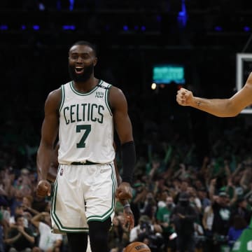 May 15, 2022; Boston, Massachusetts, USA; Boston Celtics guard Jaylen Brown (7) and forward Jayson Tatum (0) celebrate during the second half of their win over the Milwaukee Bucks in game seven of the second round of the 2022 NBA playoffs at TD Garden. Mandatory Credit: Winslow Townson-USA TODAY Sports