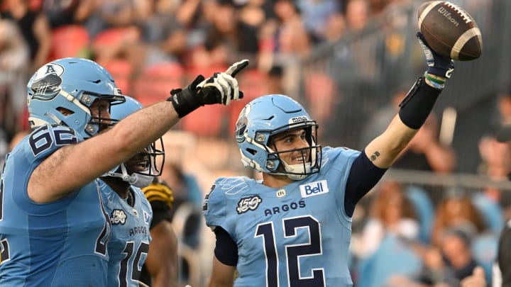 Jun 18, 2023; Toronto, Ontario, CAN;  Toronto Argonauts quarter Chad Kelly (2) celebrates after scoring a touchdown against the Hamilton Tiger-Cats in the second quarter at BMO Field. Mandatory Credit: Dan Hamilton-USA TODAY Sports