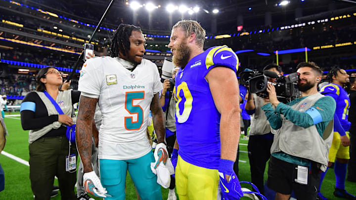 Miami Dolphins cornerback Jalen Ramsey meets with Los Angeles Rams wide receiver Cooper Kupp following an NFL game
