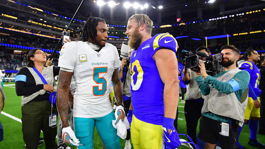 Miami Dolphins cornerback Jalen Ramsey (5) meets with Los Angeles Rams wide receiver Cooper Kupp (10) following the game at SoFi Stadium.  | Gary A. Vasquez-Imagn Images