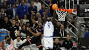 Apr 5, 2025; San Antonio, TX, USA; Duke Blue Devils center Khaman Maluach (9) shoots the ball over Houston Cougars forward Ja'Vier Francis (5) during the second half in the semifinals of the men's Final Four of the 2025 NCAA Tournament at Alamodome. Mandatory Credit: Scott Wachter-Imagn Images
