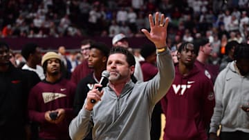 Jan 29, 2024; Blacksburg, Virginia, USA;  Virginia Tech Hokies football coach Brent Pry addresses the croud during the second half at Cassell Coliseum. Mandatory Credit: Brian Bishop-Imagn Images