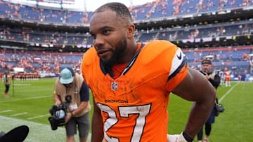 Sep 7, 2025; Denver, Colorado, USA; Denver Broncos running back J.K. Dobbins (27) after the game at Empower Field at Mile High. 
