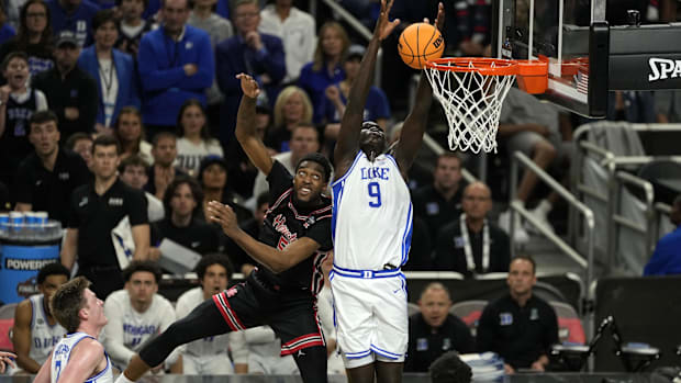 Duke Blue Devils center Khaman Maluach (9) shoots the ball over Houston Cougars forward Ja'Vier Francis (5)