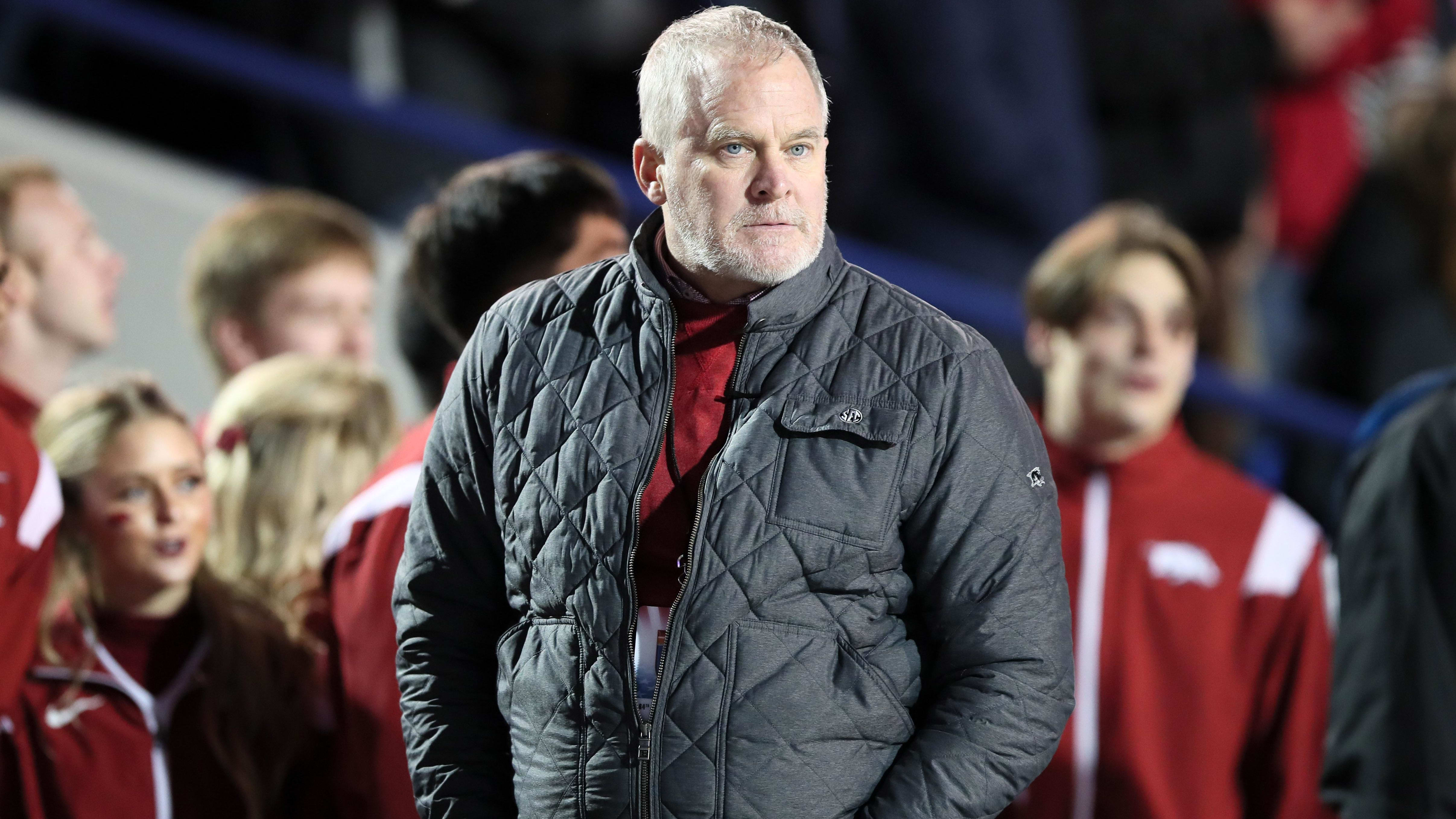 Arkansas athletics director Hunter Yurachek paces the sidelines at the Liberty Bowl.