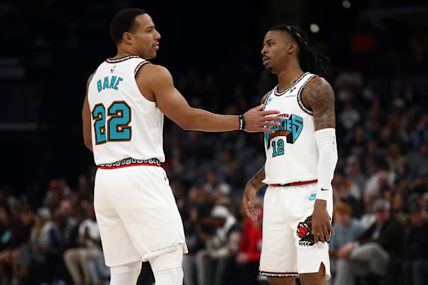 Memphis Desmond Bane (22) Grizzle Guardian reacts with the guard JA MORANT (12)