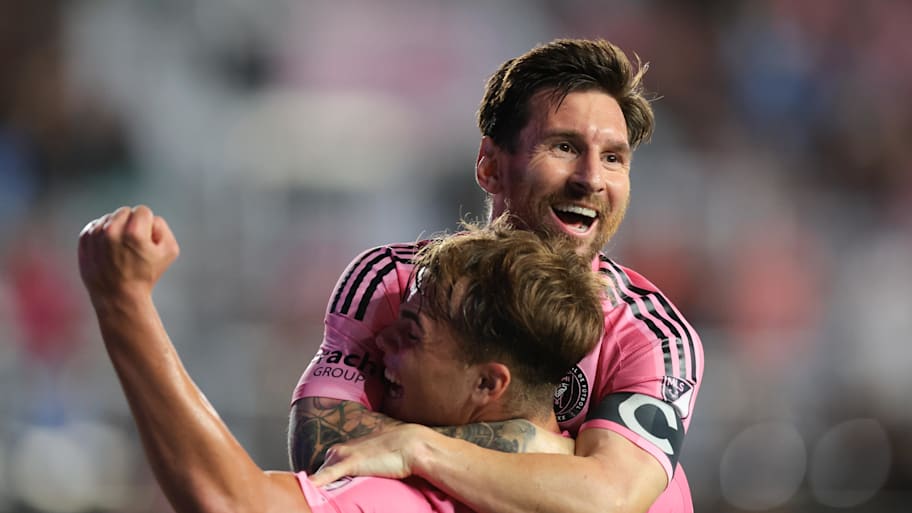 Lionel Messi celebrating with Mateo Silvetti