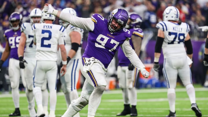 Dec 17, 2022; Minneapolis, Minnesota, USA; Minnesota Vikings defensive tackle Harrison Phillips (97) reacts to a stop during the fourth quarter against the Indianapolis Colts at U.S. Bank Stadium. Mandatory Credit: Matt Krohn-USA TODAY Sports