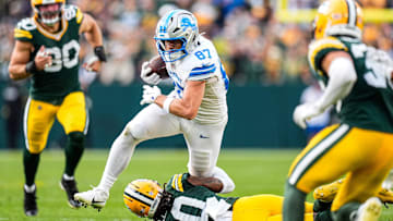 Detroit Lions tight end Sam LaPorta (87) makes a catch against Green Bay Packers safety Javon Bullard (20) during the second half at Lambeau Field in Green Bay, Wis., on Sunday, September 7, 2025.