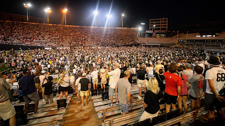 Vanderbilt fans rush the field after the Commodores' upset of No. 1 Alabama.