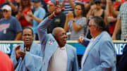 From left, former Minnesota Twins Rod Carew, Tony Oliva and Kent Hrbek acknowledge the crowd as they are introduced for the Twins Hall of Fame induction ceremony for Joe Mauer (not pictured) before the game with the Arizona Diamondbacks at Target Field in Minneapolis on Aug. 5, 2023.