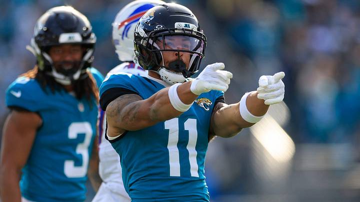 Jacksonville Jaguars wide receiver Parker Washington (11) celebrates his first down pickup during the third quarter of an NFL football AFC Wild Card playoff matchup, Sunday, Jan. 11, 2026, in Jacksonville, Fla. The Bills defeated the Jaguars 27-24. [Corey Perrine/Florida Times-Union]