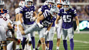 Aug 31, 2024; Manhattan, Kansas, USA; Kansas State Wildcats defensive end Ryan Davis (52) celebrates a stop during the third quarter against the Tennessee-Martin Skyhawks at Bill Snyder Family Football Stadium. Mandatory Credit: Scott Sewell-Imagn Images