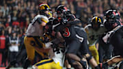 Sep 19, 2025; Piscataway, New Jersey, USA; Rutgers Scarlet Knights running back Antwan Raymond (3) scores a rushing touchdown during the second half against the Iowa Hawkeyes at SHI Stadium. Mandatory Credit: Vincent Carchietta-Imagn Images