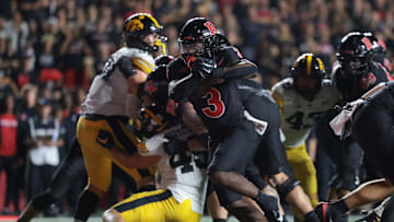 Sep 19, 2025; Piscataway, New Jersey, USA; Rutgers Scarlet Knights running back Antwan Raymond (3) scores a rushing touchdown during the second half against the Iowa Hawkeyes at SHI Stadium. Mandatory Credit: Vincent Carchietta-Imagn Images